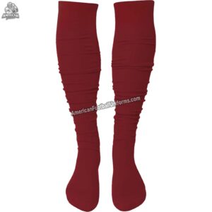 Adult custom American football socks in burgundy and green featuring moisture-wicking compression and reinforced arch support.