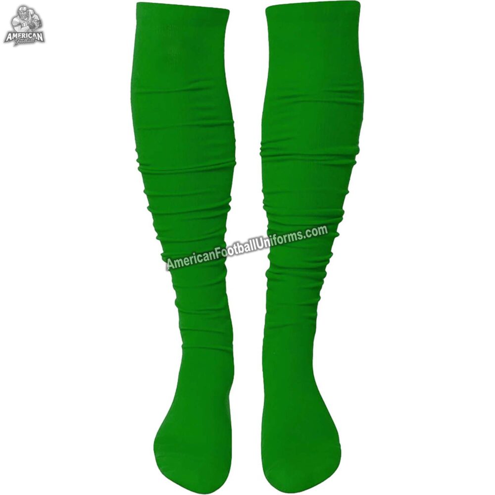 Youth American football socks in burgundy and green with targeted cushioning at the heel and toe for high-impact protection.