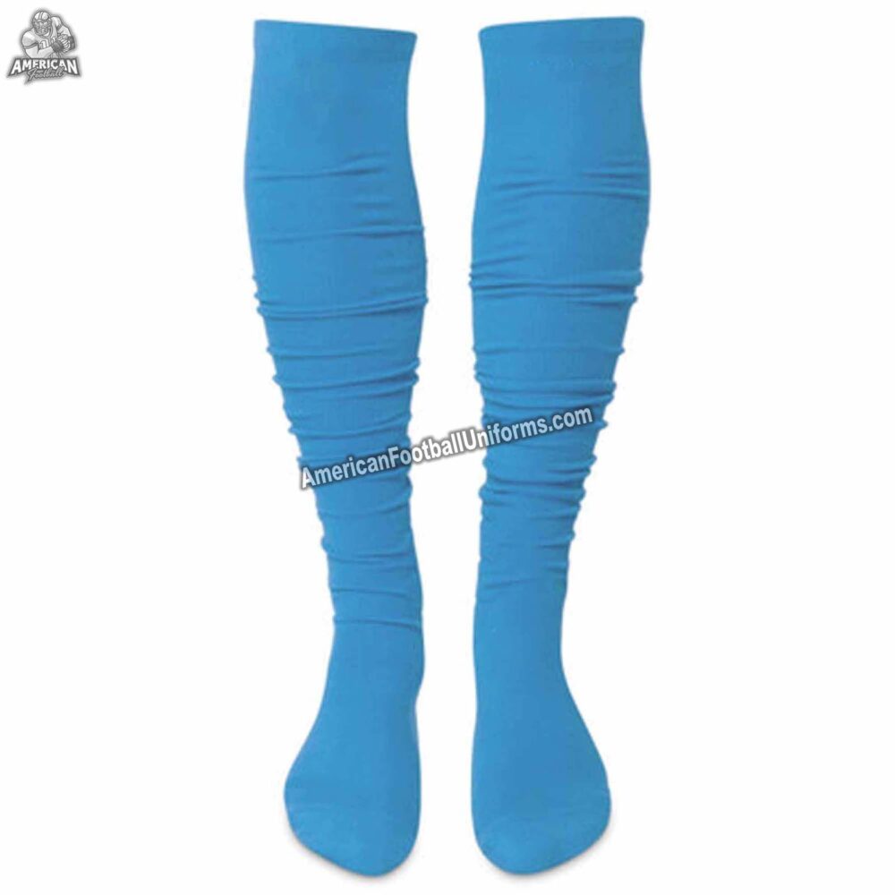 Youth American football socks in yellow and royal blue with targeted cushioning at the heel and toe for impact protection.