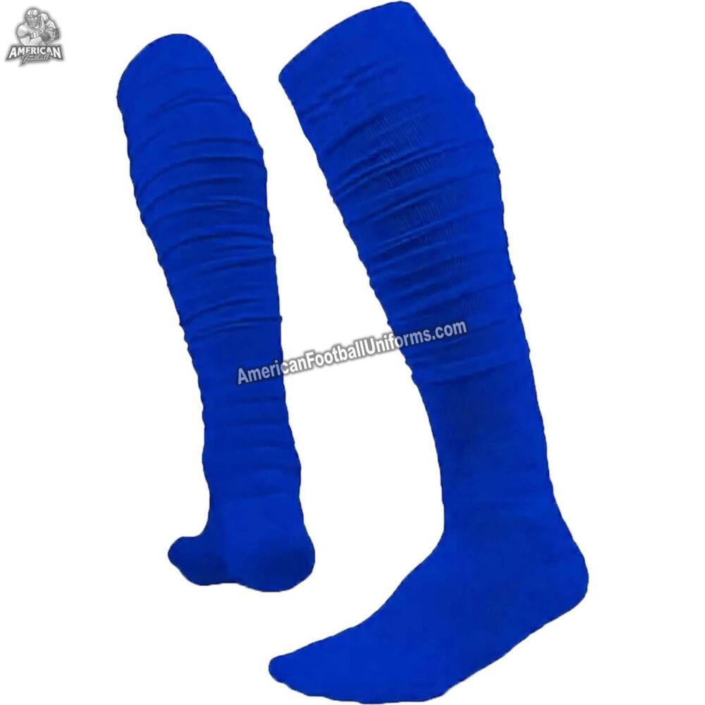 Close-up of custom football socks showing vibrant yellow and royal blue stripes with high-definition team logo sublimation.
