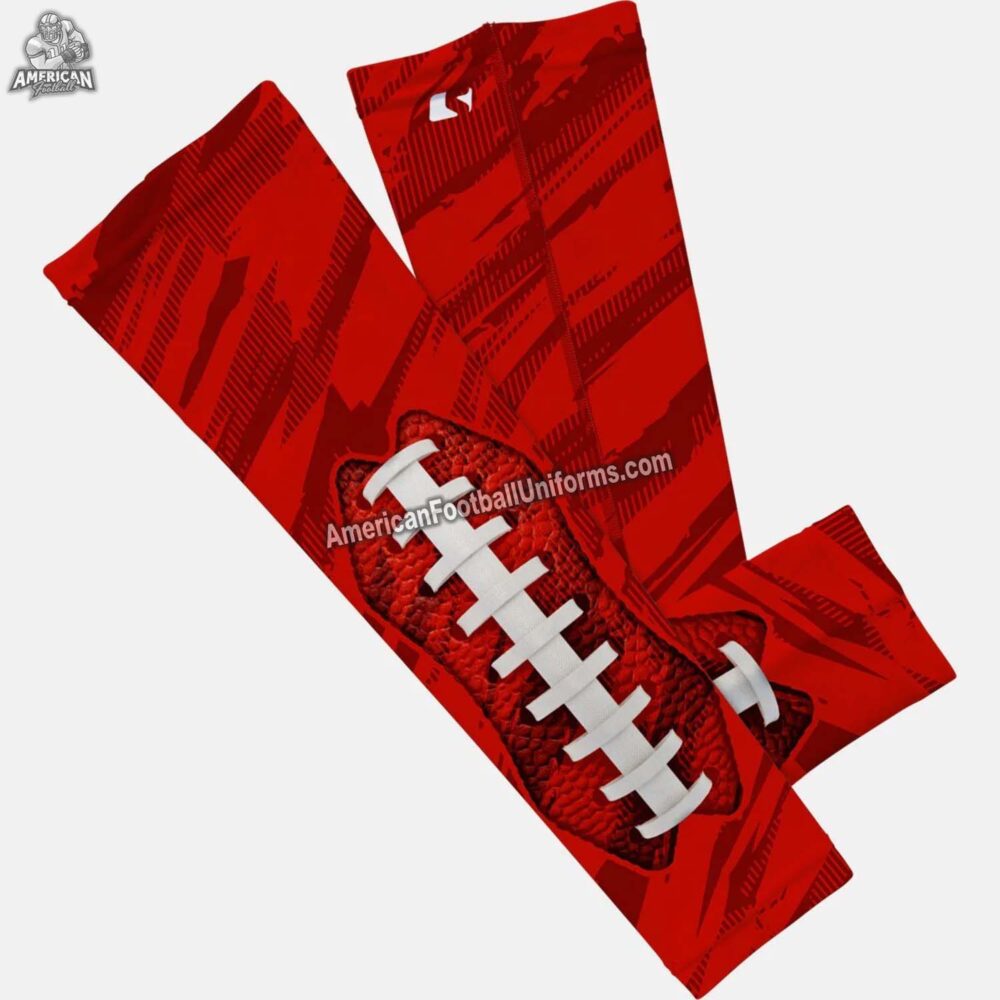 Detail shot of American Football Uniforms red arm sleeve showing the anti-slip silicone interior band and moisture-wicking weave.
