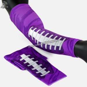 American Football Uniforms custom purple arm sleeves featuring high-tension compression fabric and flat-lock reinforced seams.