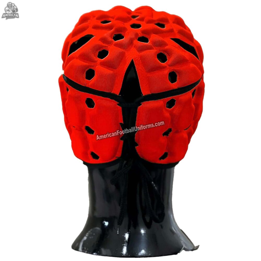 Youth player wearing the MimiSports USA red flag football headgear during a 7v7 game, demonstrating field visibility and fit.