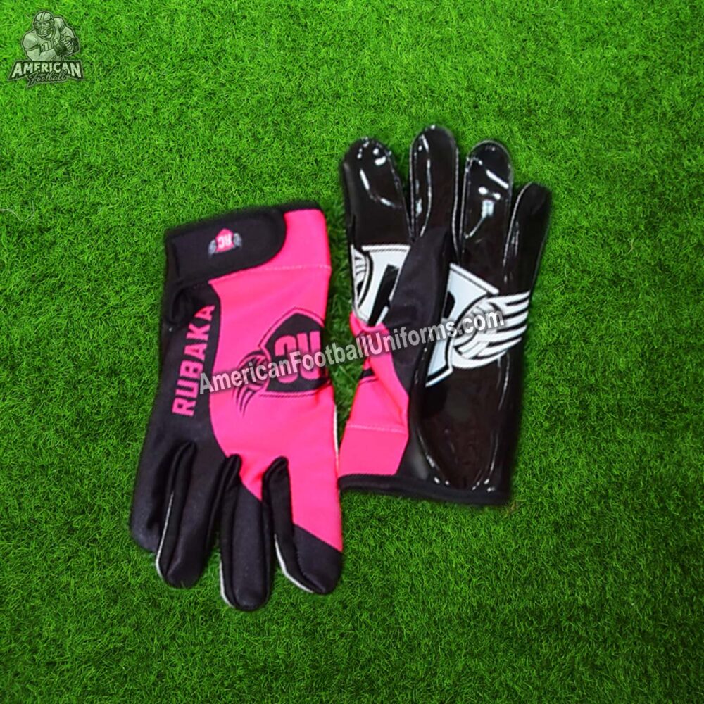 Close-up of American Football Uniforms hot pink football gloves with high-tack silicone palms and flexible backhand mesh.
