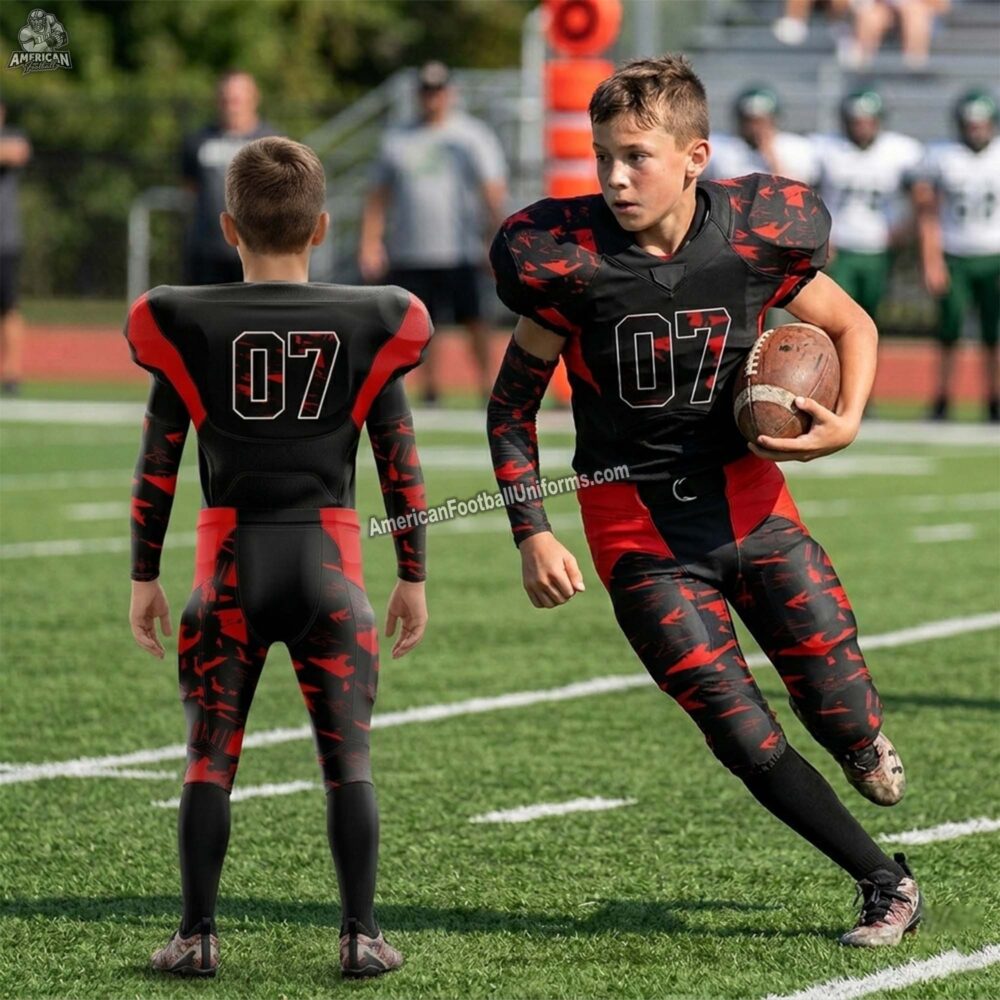 Adult custom American football uniform in a striking red and black color scheme featuring reinforced stitching and mesh panels.