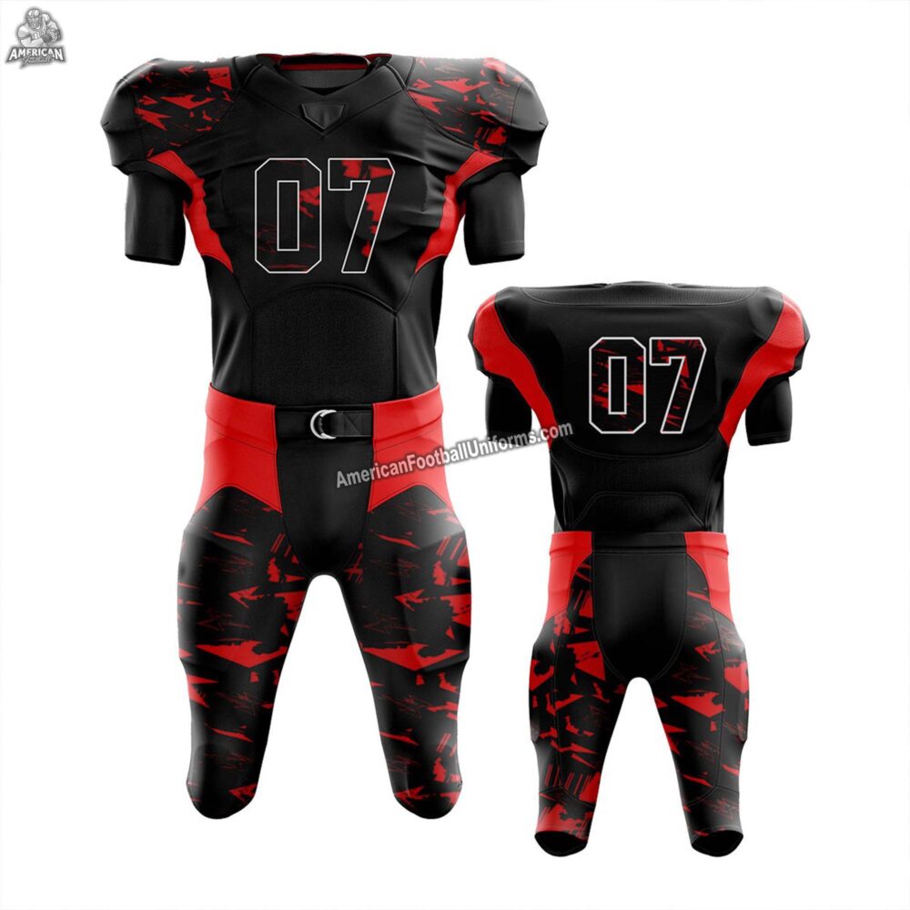 Youth American football uniform set in red and black with integrated padding slots and high-stretch performance spandex.