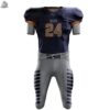 Close-up of a grey and navy custom football uniform showcasing high-definition sublimation printing and precision tackle twill lettering.